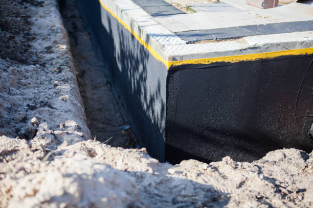Professional Waterproofing technician working in Baldwin, MD